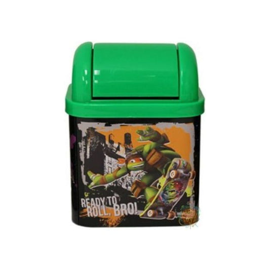 A small green Tin Box Company Teenage Mutant Ninja Turtles Desktop Waste Bin with a black base featuring a graphic of the Teenage Mutant Ninja Turtles and the phrase "Ready To Roll" on the side.